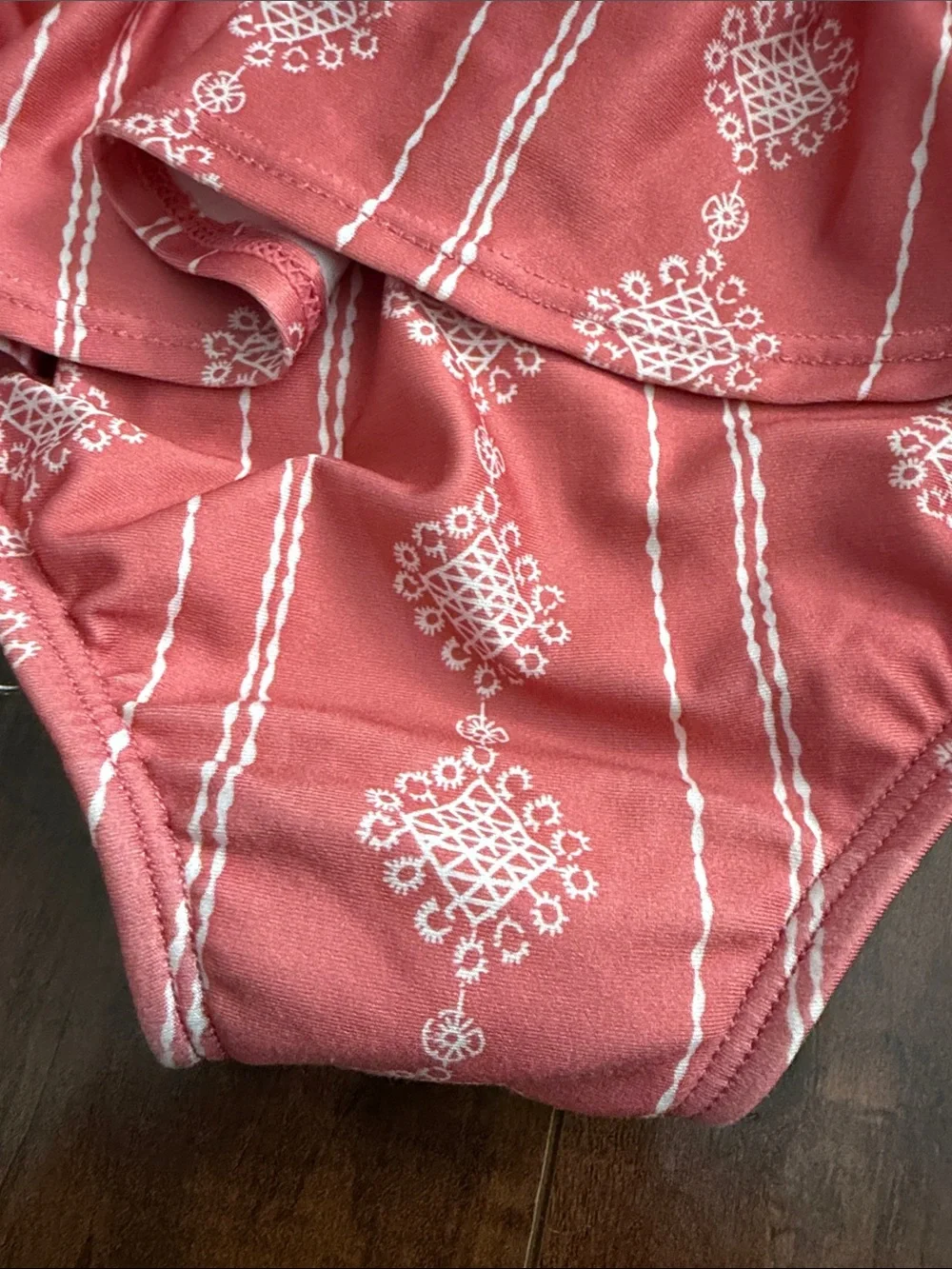 Well Dressed Wolf Coral Pink Peplum One-Piece Suit with Tie Straps (Wildling)